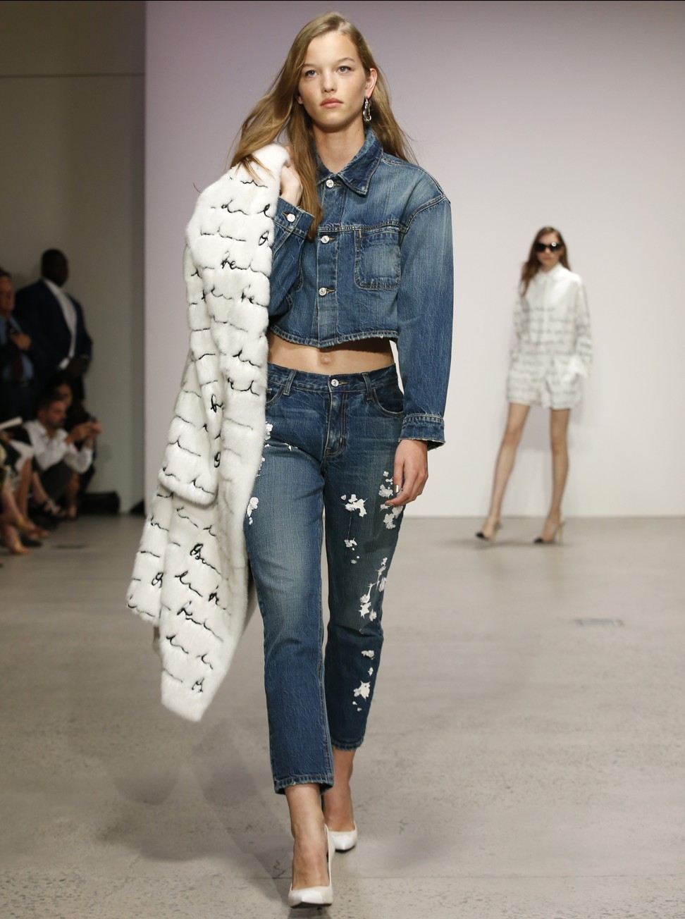 A model walks presents a denim and fur look on the runway at the Oscar de la Renta spring/summer 2018 fashion show during New York Fashion Week. Photo: AP