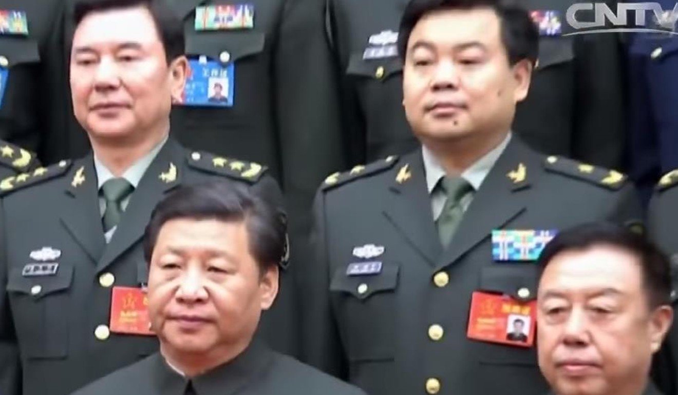 Major General Zhong Shaojun (top right) pictured with President Xi Jinping (bottom left) and members of the military reform task force. Photo: CCTV