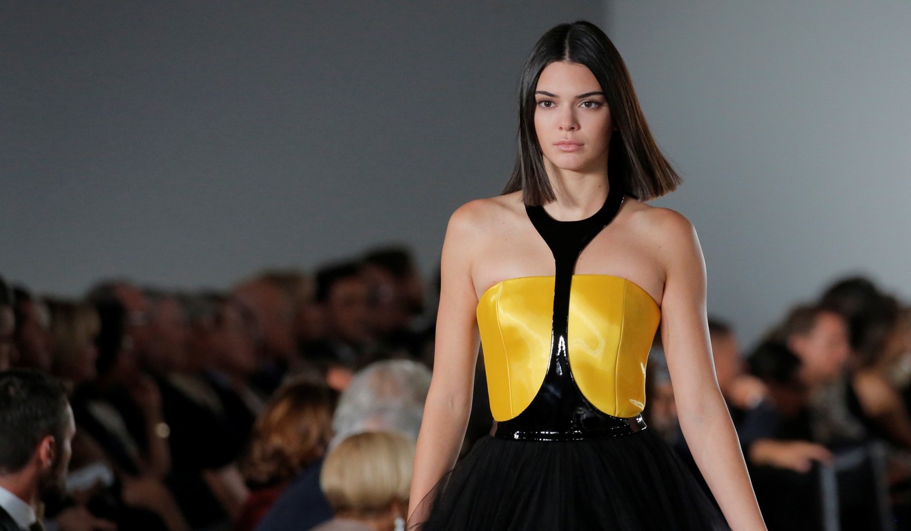 Kendall Jenner presents a creation from the Ralph Lauren spring/summer 2018 collection in a show that was presented in Lauren's private garage for New York Fashion Week. Photo: REUTERS