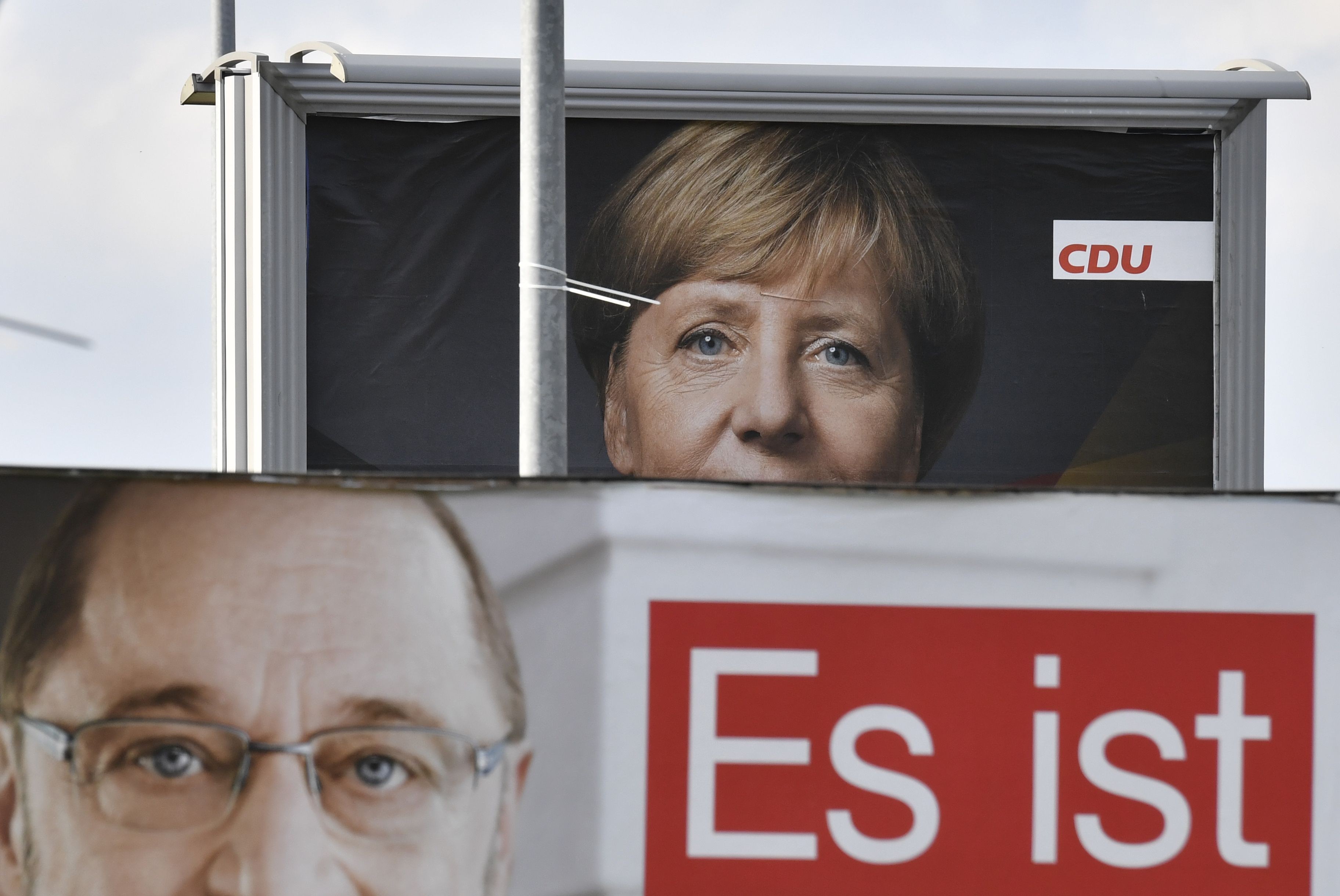 Billboards featuring Angela Merkel and Martin Schulz. Photo: AFP