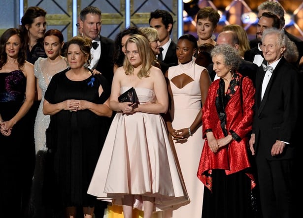 Elisabeth Moss (left) and author Margaret Atwood (far right) with cast and crew of 'The Handmaid's Tale' accept the Outstanding Drama Series award onstage during the 69th Annual Emmy Award. Photo: AFP