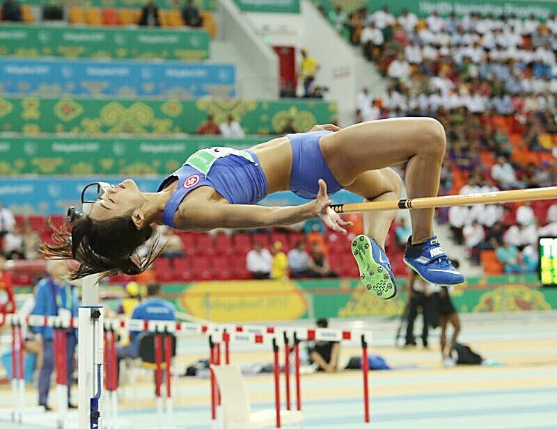 Hong Kong's Cecilia Yeung competes in the women's high jump at the Asian Indoor Games in Ashgabat, Turkmenistan. Photos: SF&OC