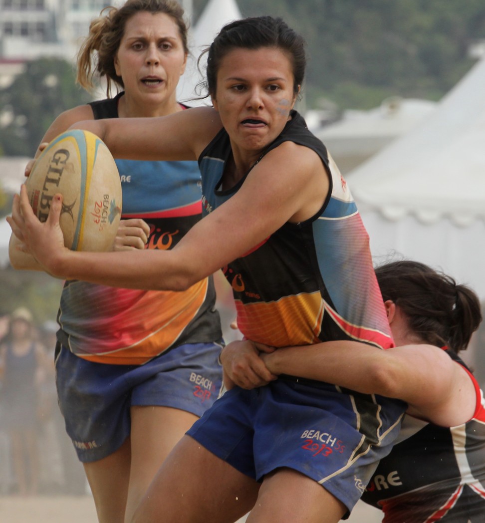 Carder playing rugby for Valley Black during the Hong Kong Beach 5s women’s cup final in 2013. Photo: Felix Wong