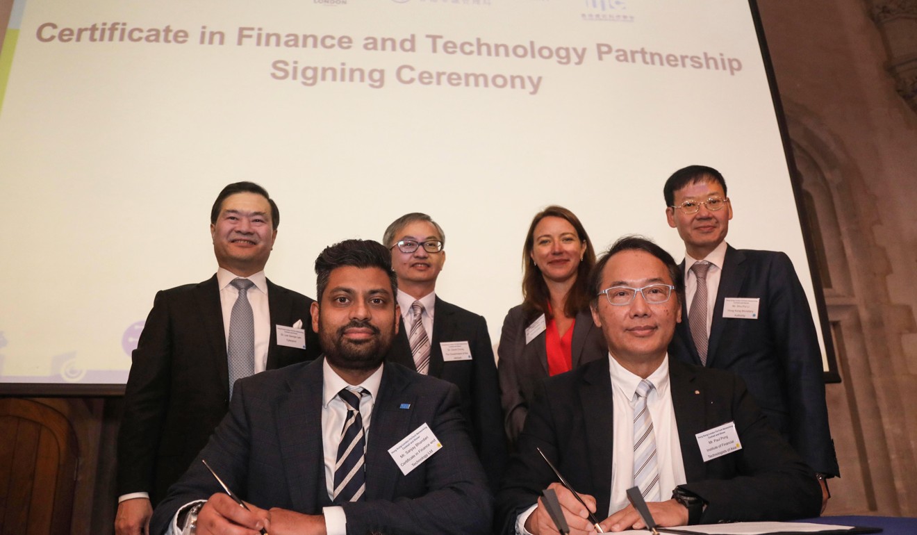 IFTA chairman Paul Pong (right), hopes to localise the fintech training given to his organisation’s British counterpart. Photo: Handout