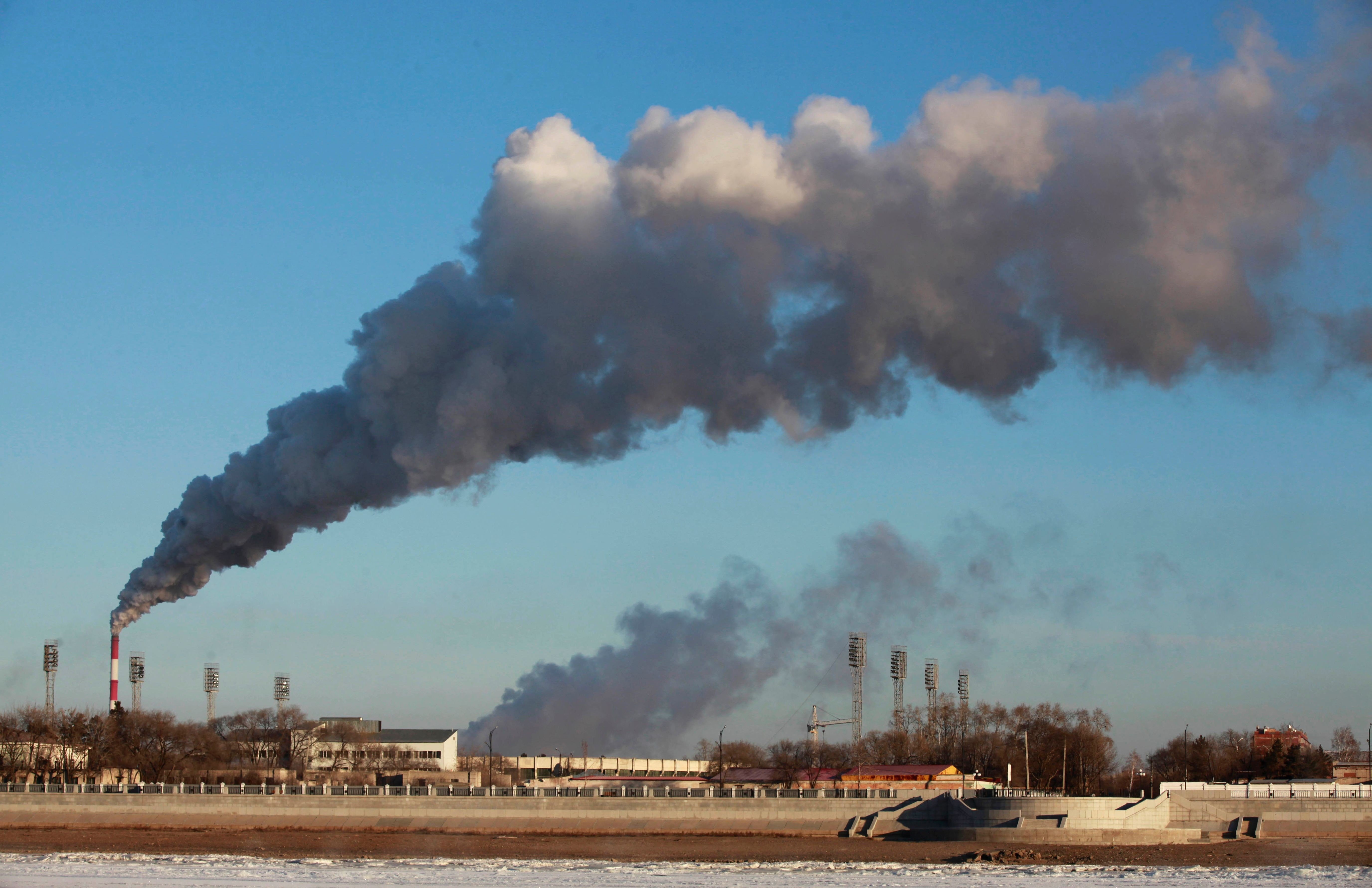 Smoke billows from a heating factory in Heihe, in China's Heilongjiang province. In November, China will launch its nationwide carbon trading platform, set to become the world’s largest carbon trading market. Photo: AFP