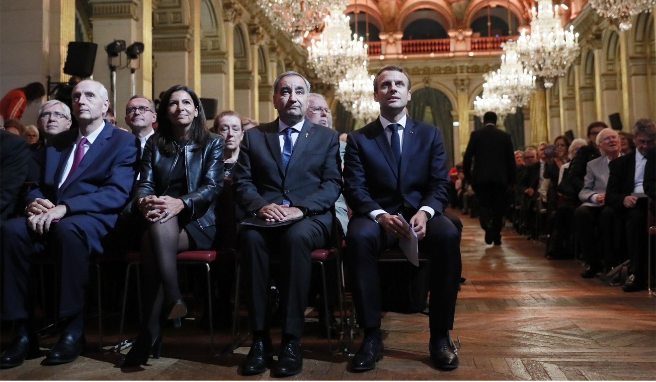 Macron (right) at a ceremony to mark the 500th anniversary of Protestant Reform. Photo: AFP