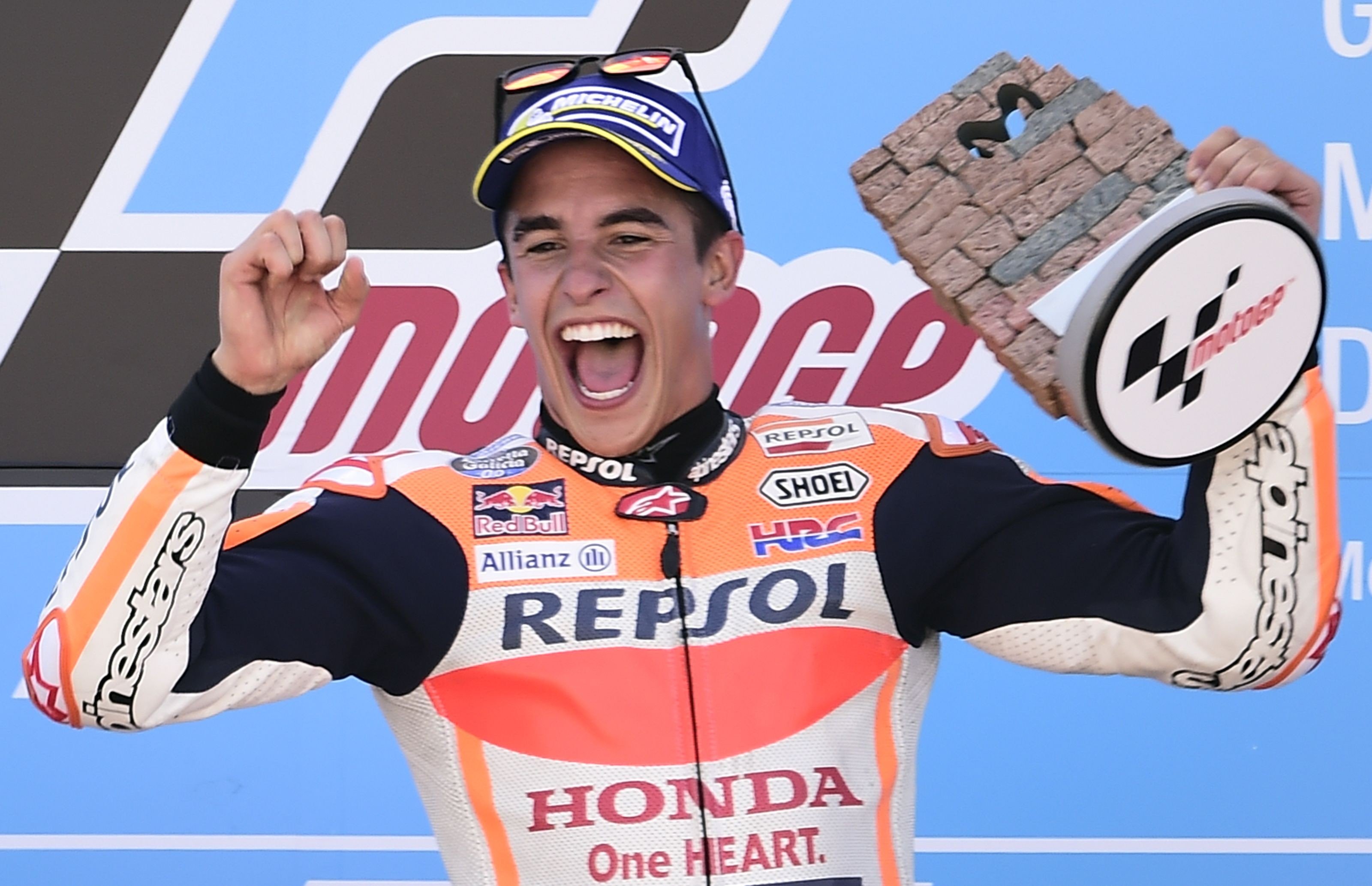 Repsol Honda Team's Spanish rider Marc Marquez celebrates on the podium. Photo: AFP