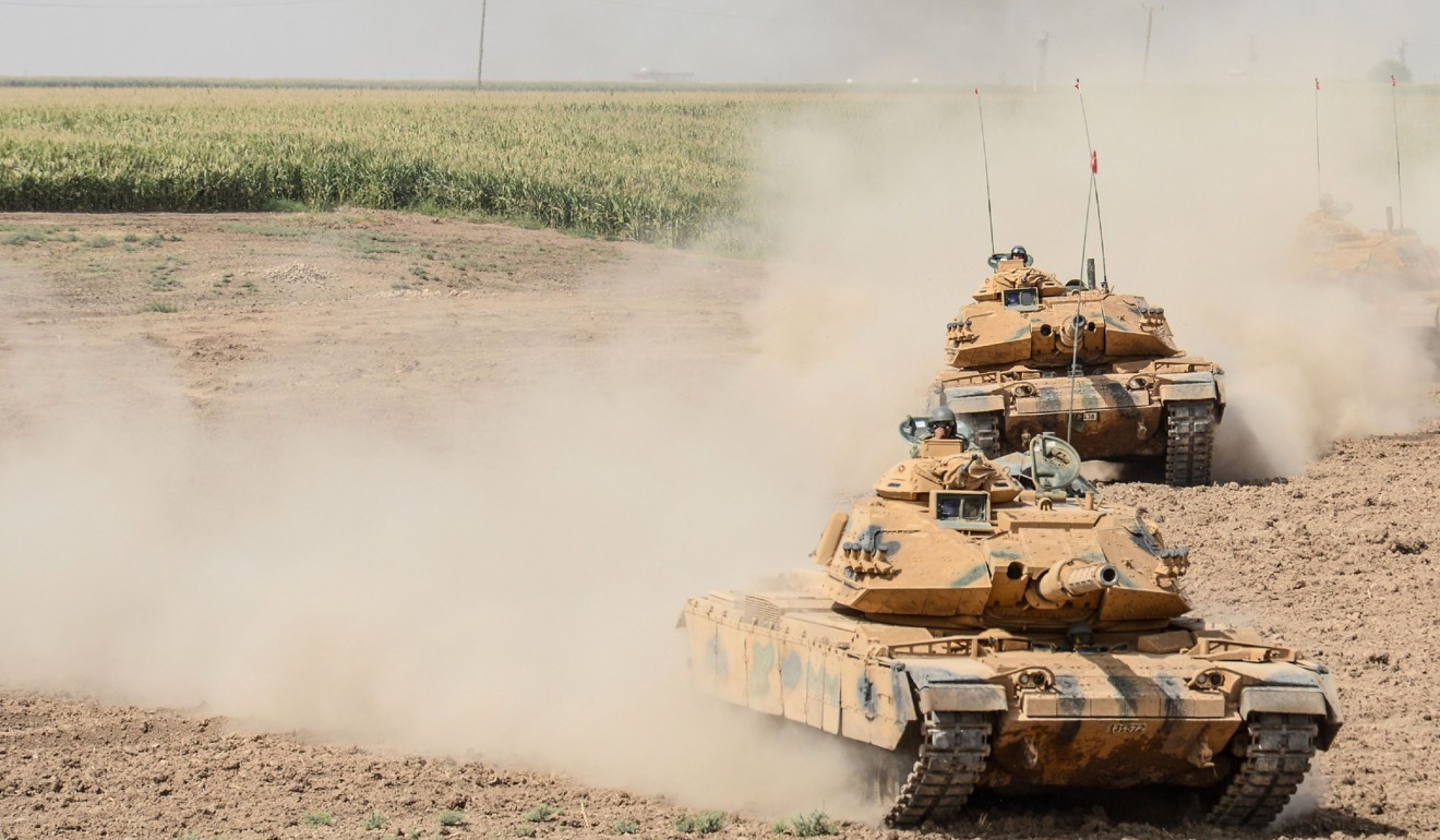 Tanks move during a Turkish and Iraqi joint military exercise near the Turkish-Iraqi border at Silopi district in Sirnak on September 26, 2017. Photo: AFP