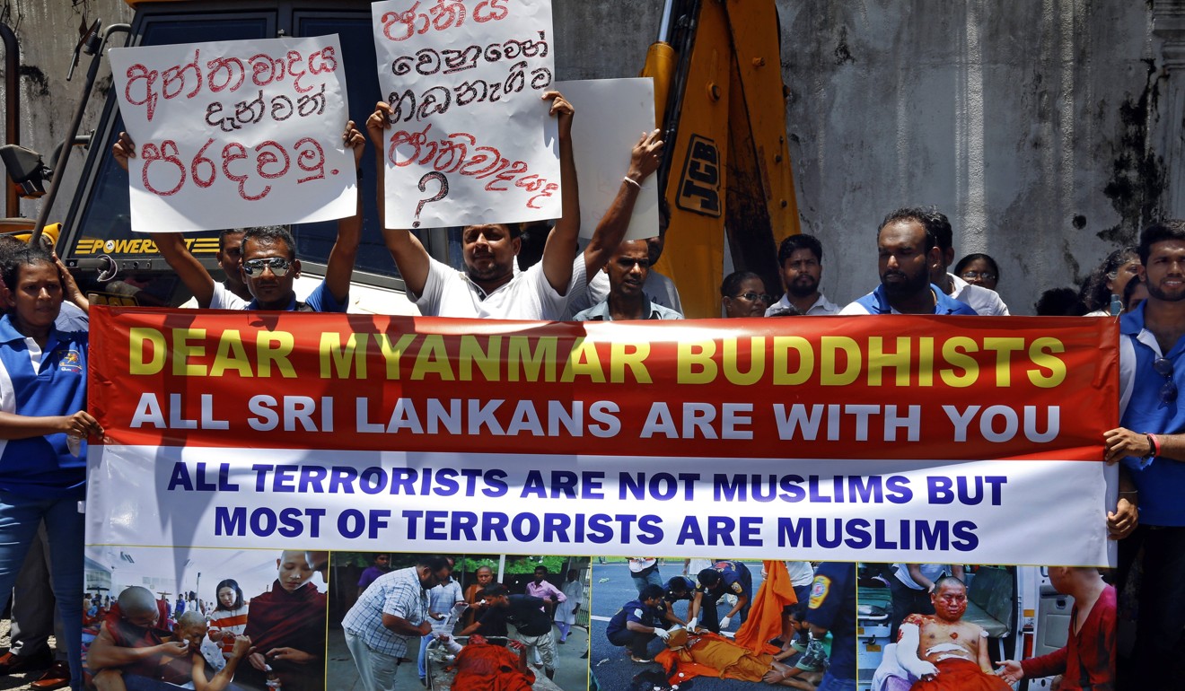 Members from the Sinhala Api National Organisation gather outside Myanmar’s embassy in Colombo. Photo: EPA