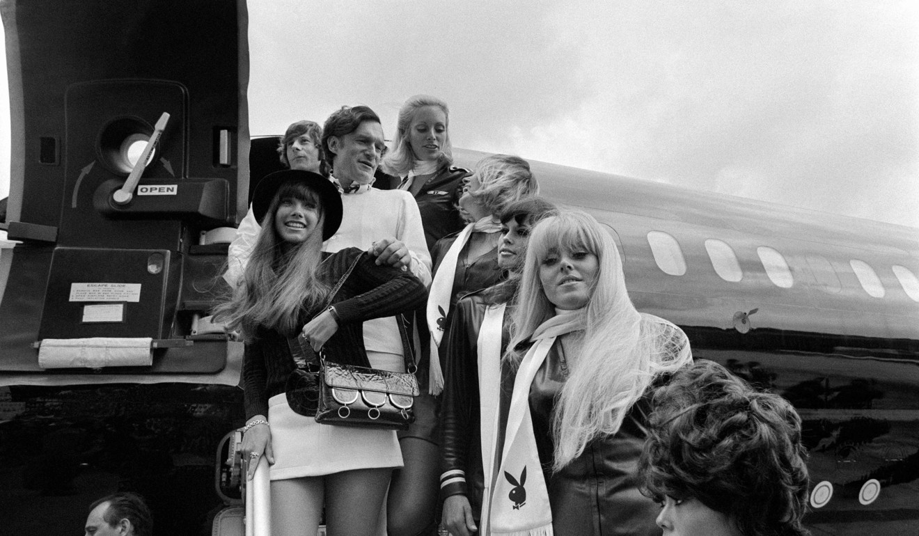 This file photo taken on August 21, 1970 shows US Playboy Magazine publisher Hugh Hefner (top centre), his girlfriend actress Barbara Benton (left), film director Roman Polanski (top left), and a bevy of Playboy bunnies arriving at Le Bourget airport in the Playboy jet Big Bunny. Photo: AFP