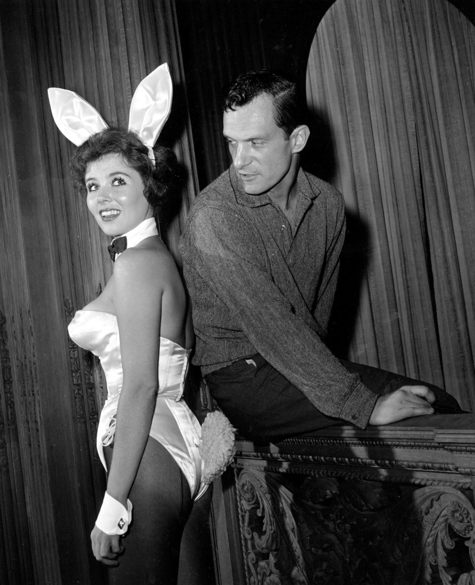 In this June 20, 1961 file photo, Playboy magazine publisher Hugh Hefner poses with bunny-girl hostess Bonnie J. Halpin at Hefner's nightclub in Chicago. Photo: AP