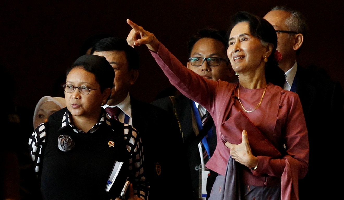 Myanmar’s State Counsellor Aung San Suu Kyi leads the way after a meeting of Asean foreign ministers and officials, in Yangon last December 19. Photo: Reuters