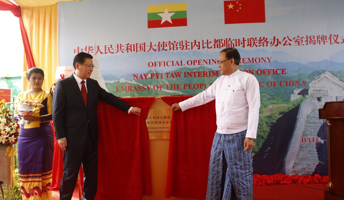 China’s ambassador to Myanmar, Hong Liang (left), and Myanmar’s deputy foreign minister Kyaw Tin unveil a ceremonial plaque to mark the opening of the Chinese embassy’s Naypyidaw Interim Liaison Office, on September 8. Photo: EPA-EFE