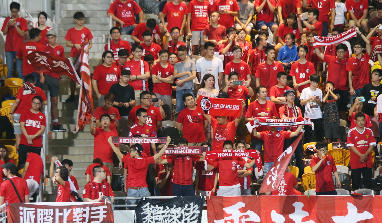A block of Hong Kong football fans were seen jeering the anthem before their team trounced the visitors 4-0. Photo: David Wong