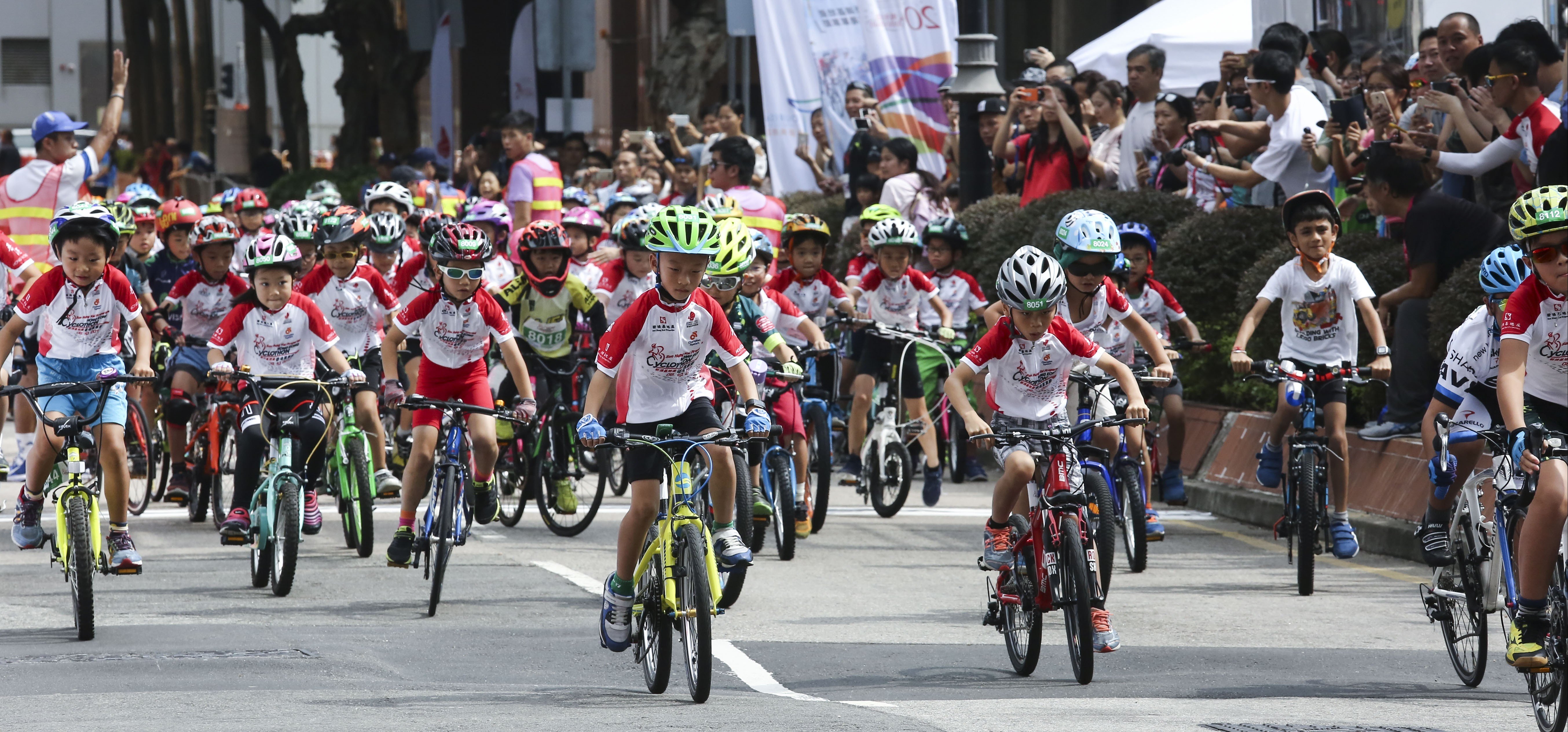 Young riders compete in the Kids and Youth Rides event in Tsim Sha Tsui as part of Sunday’s cyclothon. Photo: Jonathan Wong