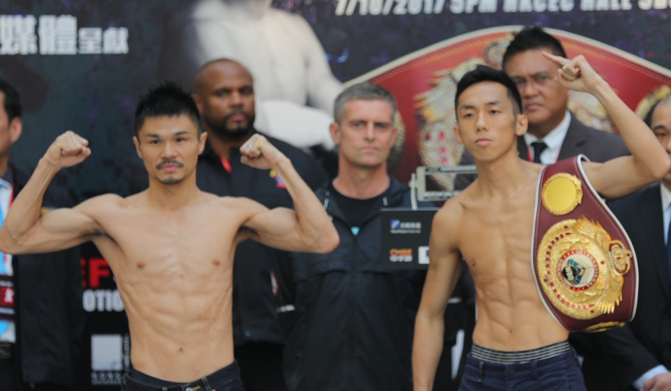 Kohei Kono and Rex Tso pose for cameras at the official weigh-in.