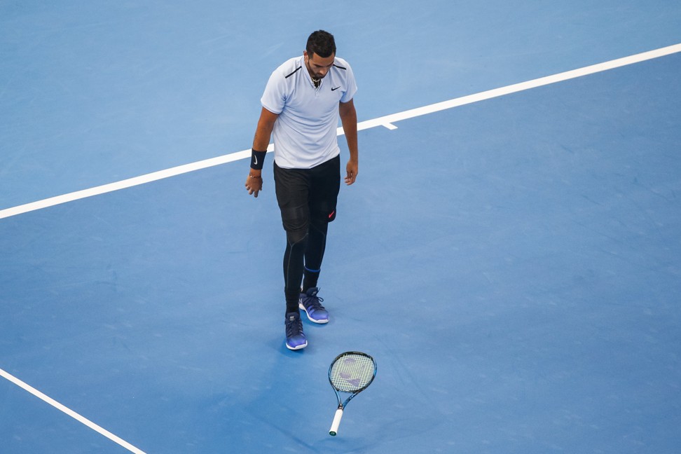 Kyrgios throws his racquet during the final against Nadal as frustration got the better of him. Photo: EPA