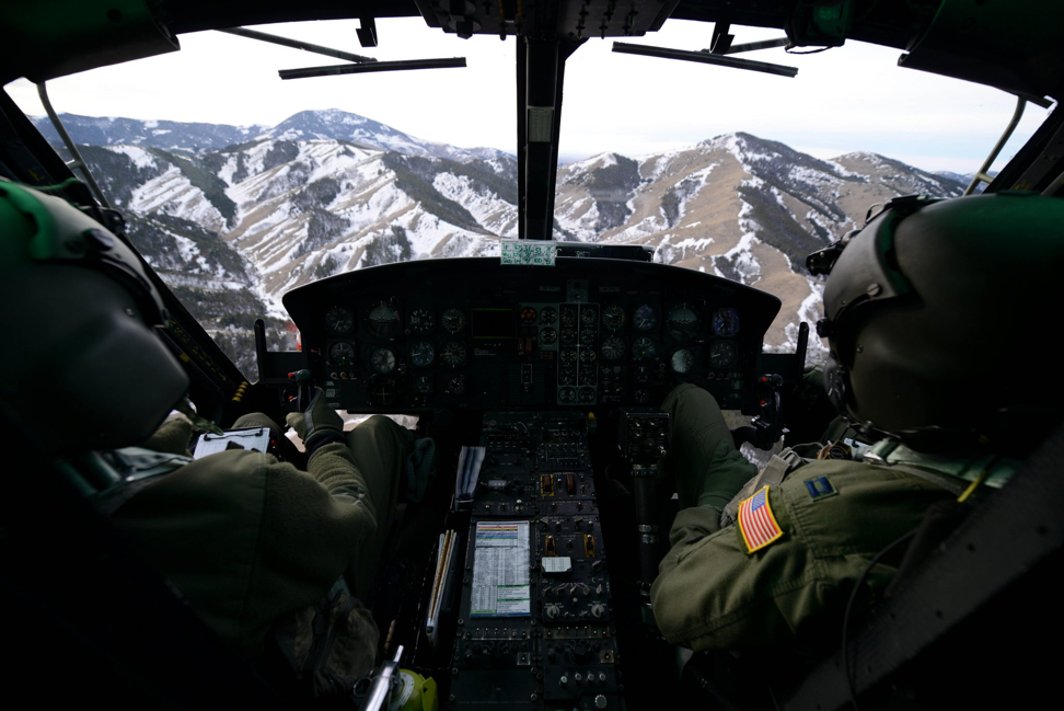 First Lt. Greg Johnston and Capt. RJ Bergman fly their UH-1N Iroquois over a mountain range near Malmstrom Air Force Base, January 27, 2015. Photo: US Air Force/Airman 1st Class Dillon Johnston