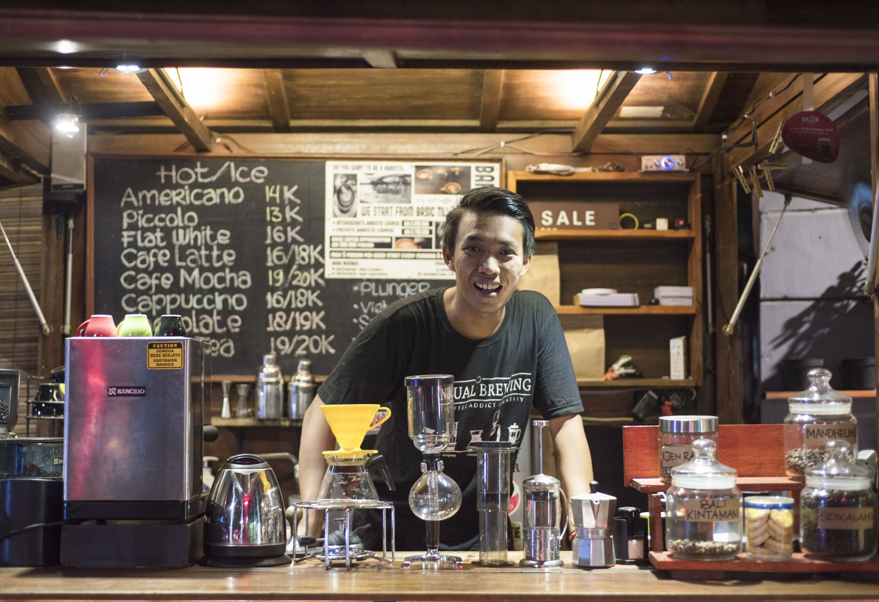 Barista Benjamin Sodip at Kopi Mank, a cafe on one of south Jakarta’s most notoriously congested streets. Photo: Antony Dickson
