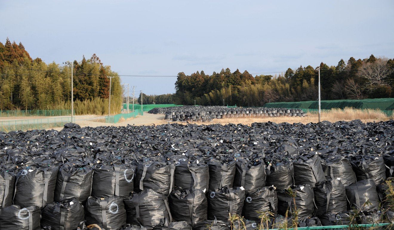 Bags of contaminated soil are seen in Tomioka, Fukushima prefecture, in February, almost six years after the Fukushima disaster in Japan. Photo: Xinhua