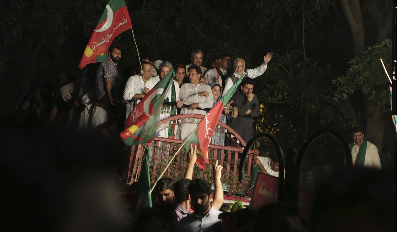 Khan campaigning for his party in Lahore, Pakistan. Photo: AP