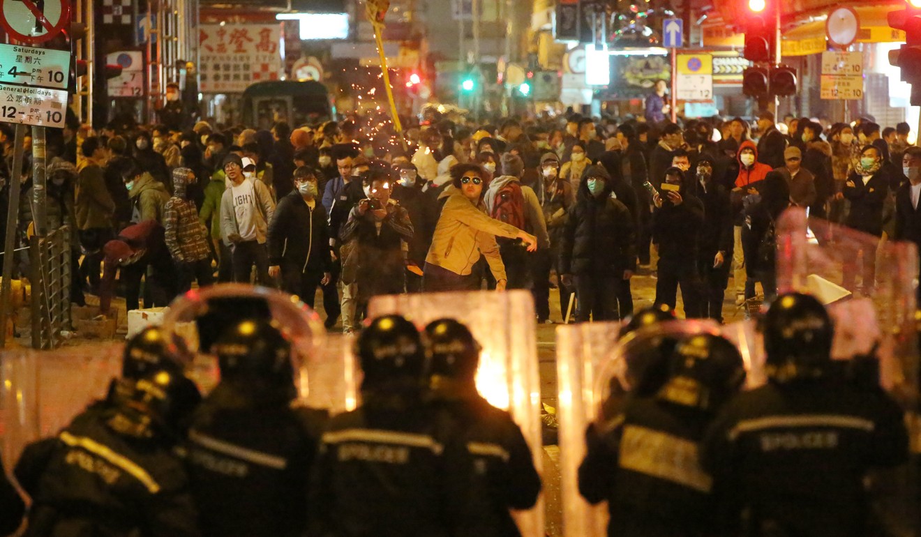 Police and protesters face off in Mong Kok in 2015. Photo: Edward Wong