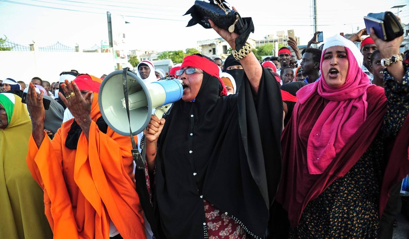 People chant slogans as they protest against the deadly bomb attack in Mogadishu. More than 300 people died in the attack, which is yet to be officially claimed by any group. Photo: Agence France-Presse