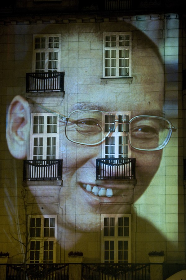 A portrait of Nobel laureate Liu Xiaobo is projected on a wall of a hotel during a torch parade in his honour in Oslo on December 10, 2010. Picture: AFP