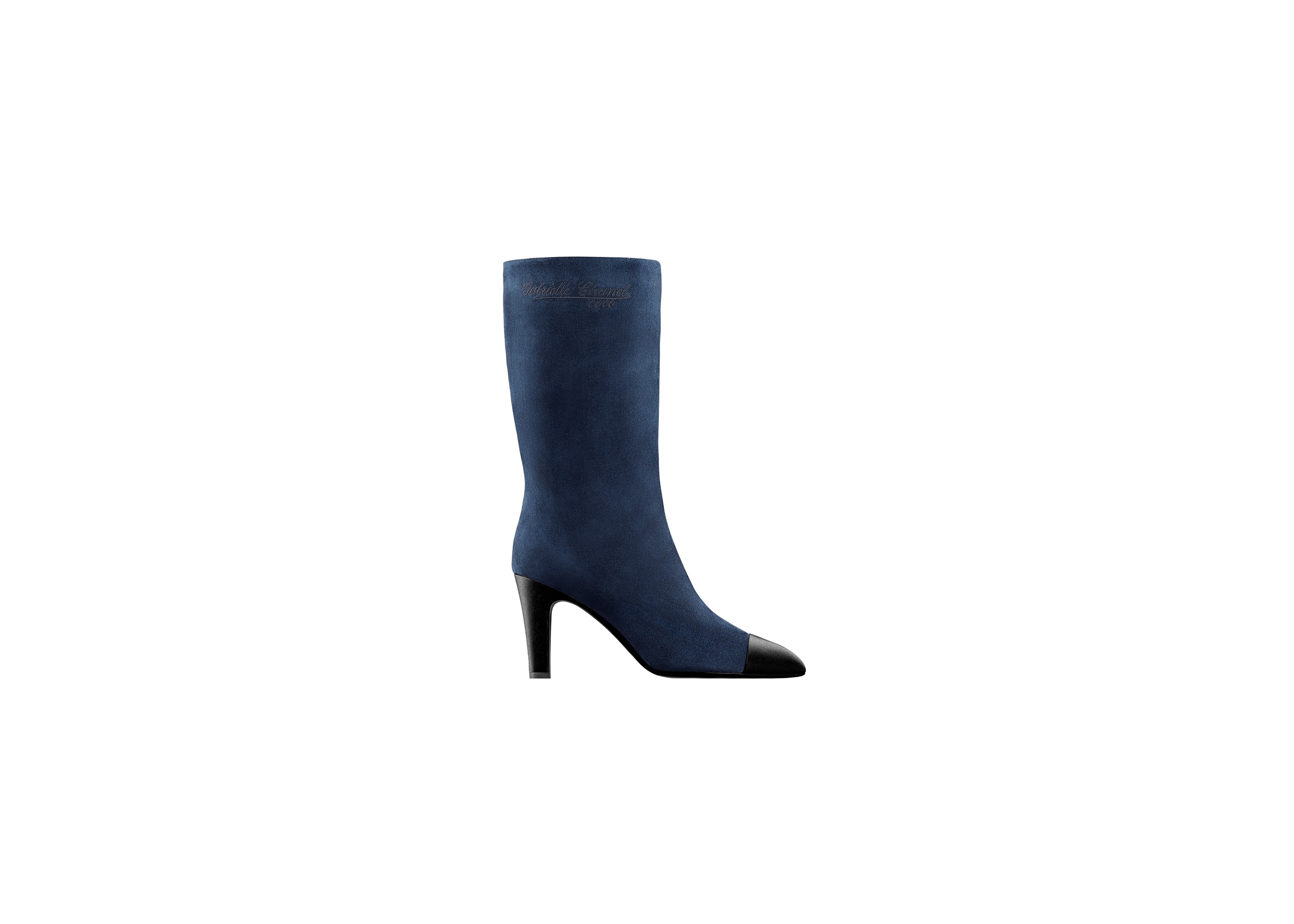 Step out in Chanel’s navy suede boots and enjoy the envious glances that come your way