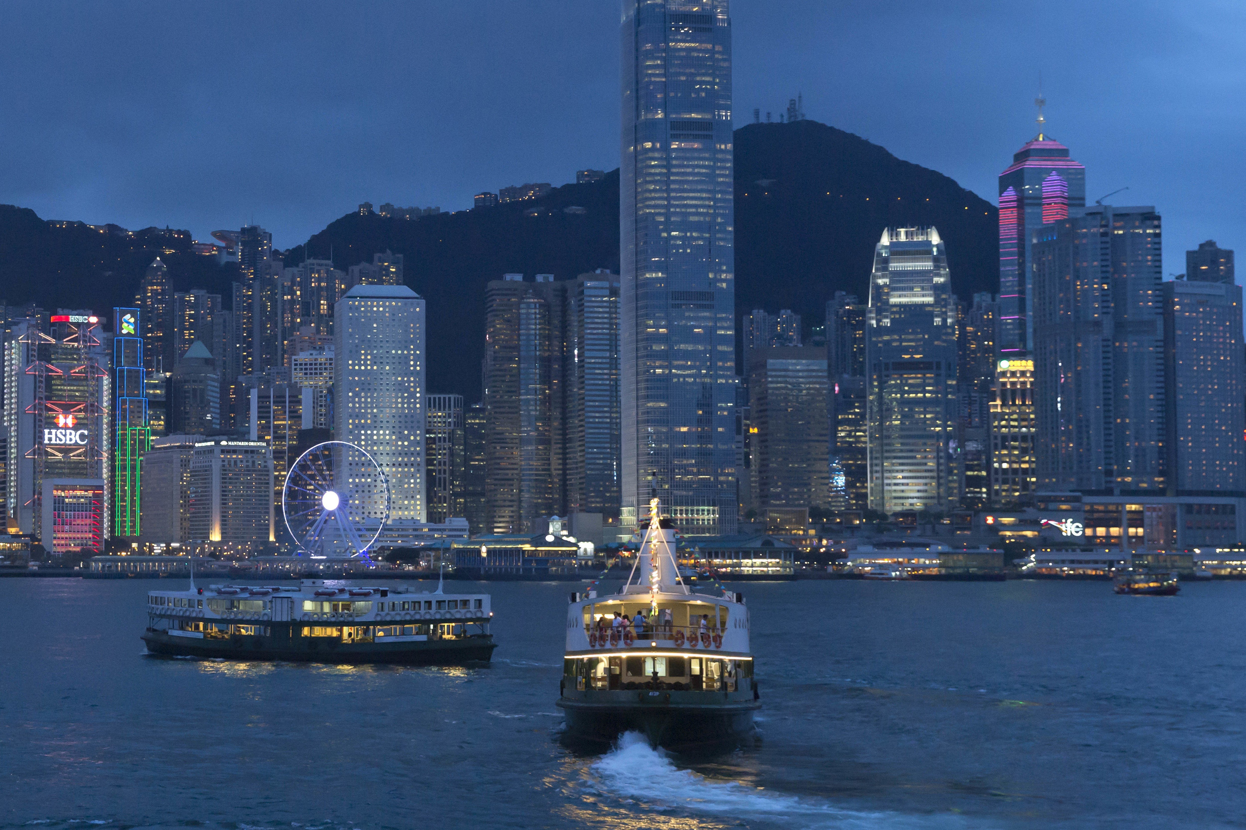 A view of Victoria Peak and Central District from Victoria Harbour at night in July. Hong Kong is a great experiment in a melding of Eastern and Western culture. Photo: AP