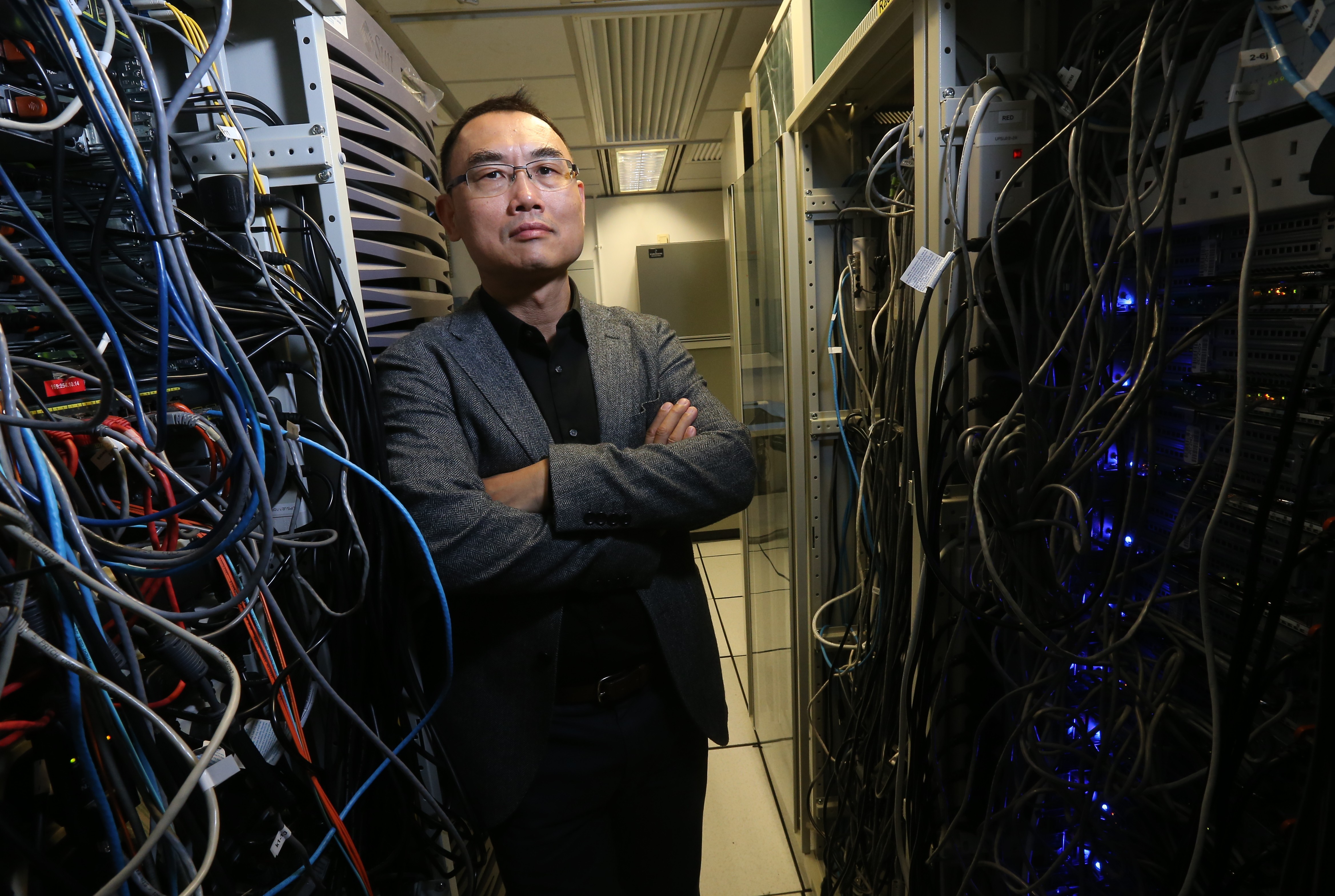 Yang Qiang, professor of artificial intelligence at the Hong Kong University of Science and Technology, discusses a partnership between HKUST and WeChat to grant university researchers access to data generated by the mobile app’s users. Photo: Dickson Lee
