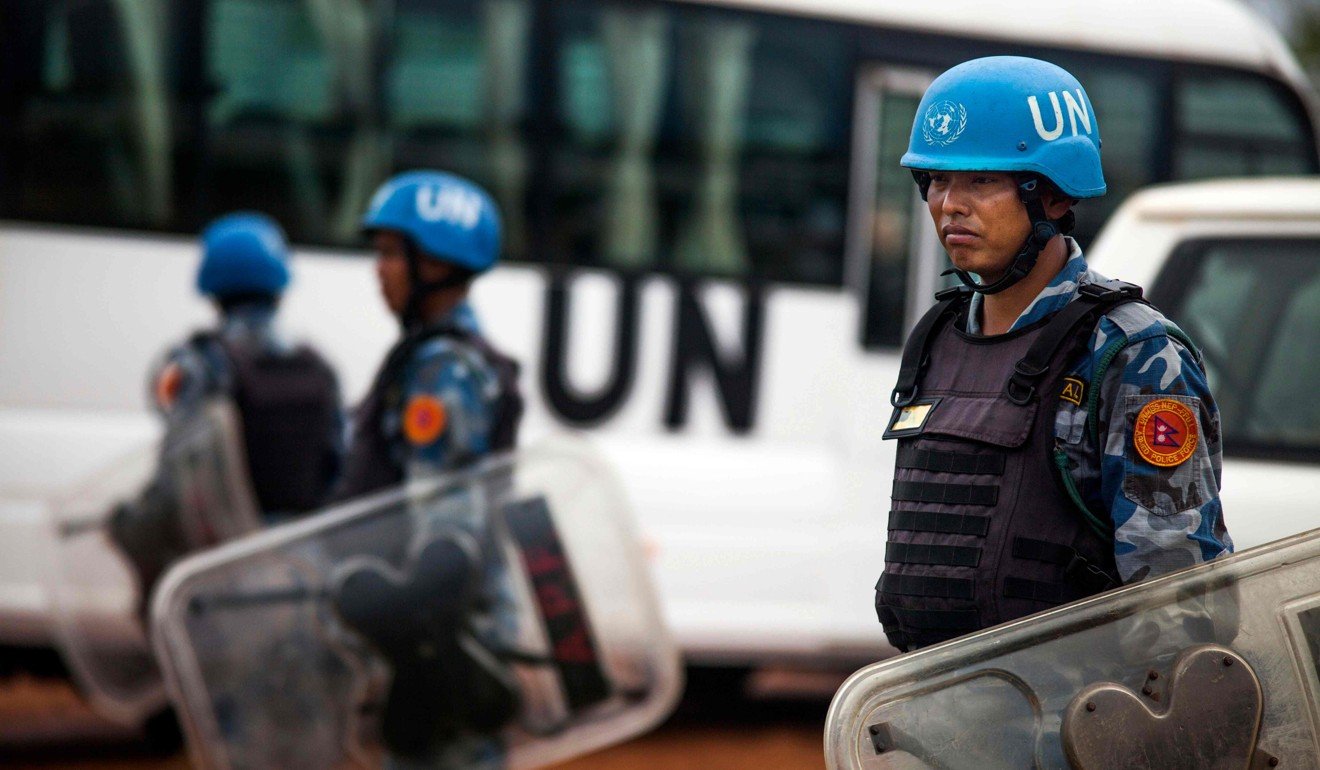 Nepalese members of UN anti-riot police stand guard during a visit by the US Ambassador to the United Nations, Nikki Haley, to the UN Prefugee camp Juba, South Sudan, on Wednesday. Photo: AFP
