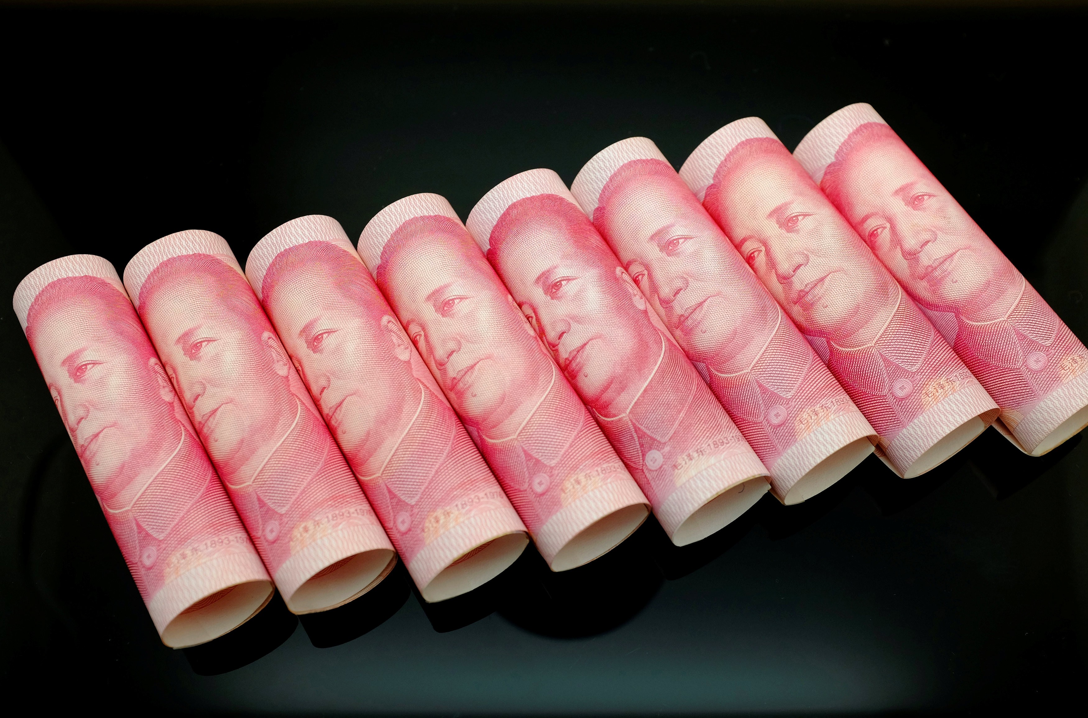 China will loosen grip on the yuan at a time of its own choosing. Photo: Reuters