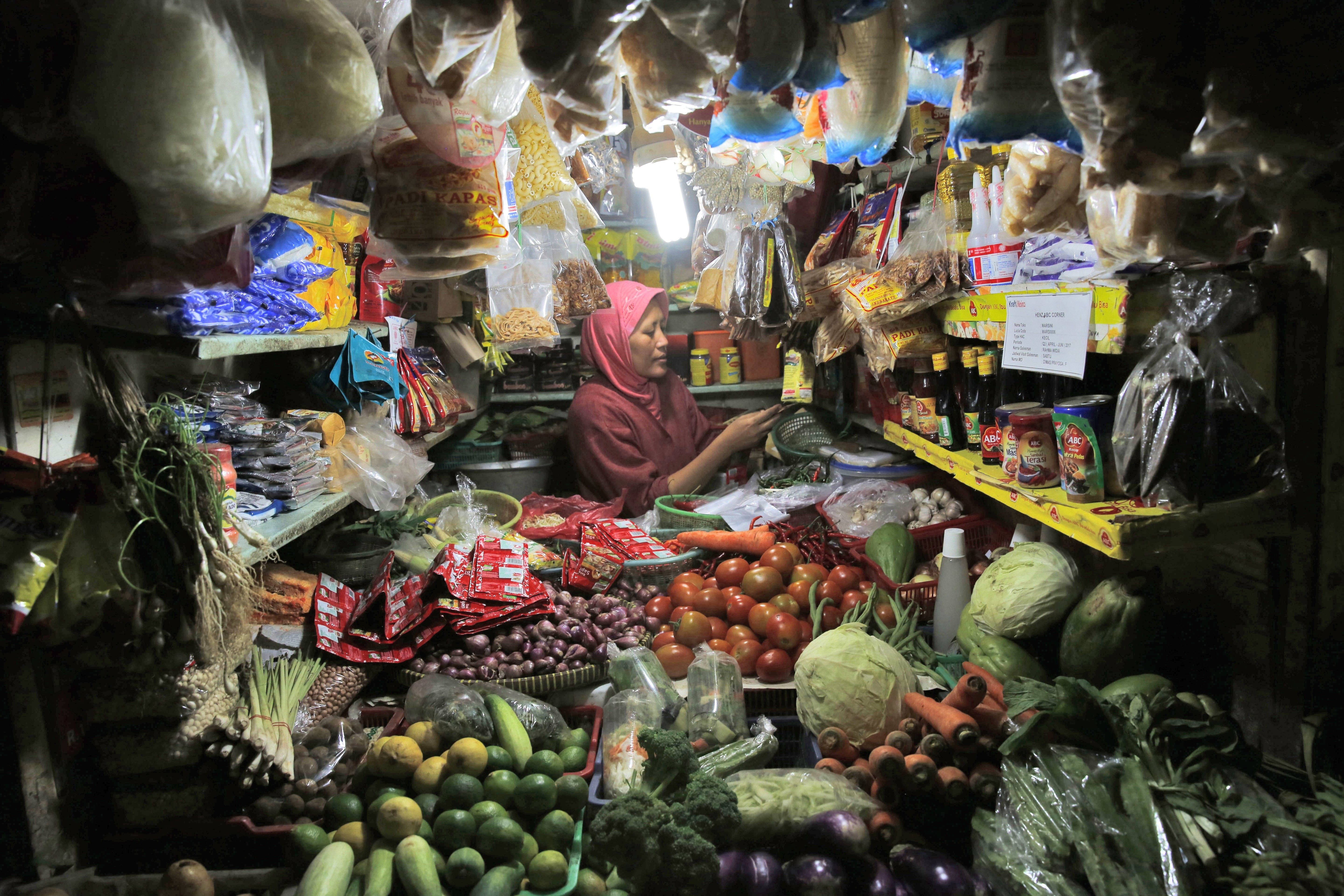 A vegetable vendor at a traditional market in Jakarta. The Asean countries represent an attractive young market that is likely to attract more venture-investing. Photo: EPA