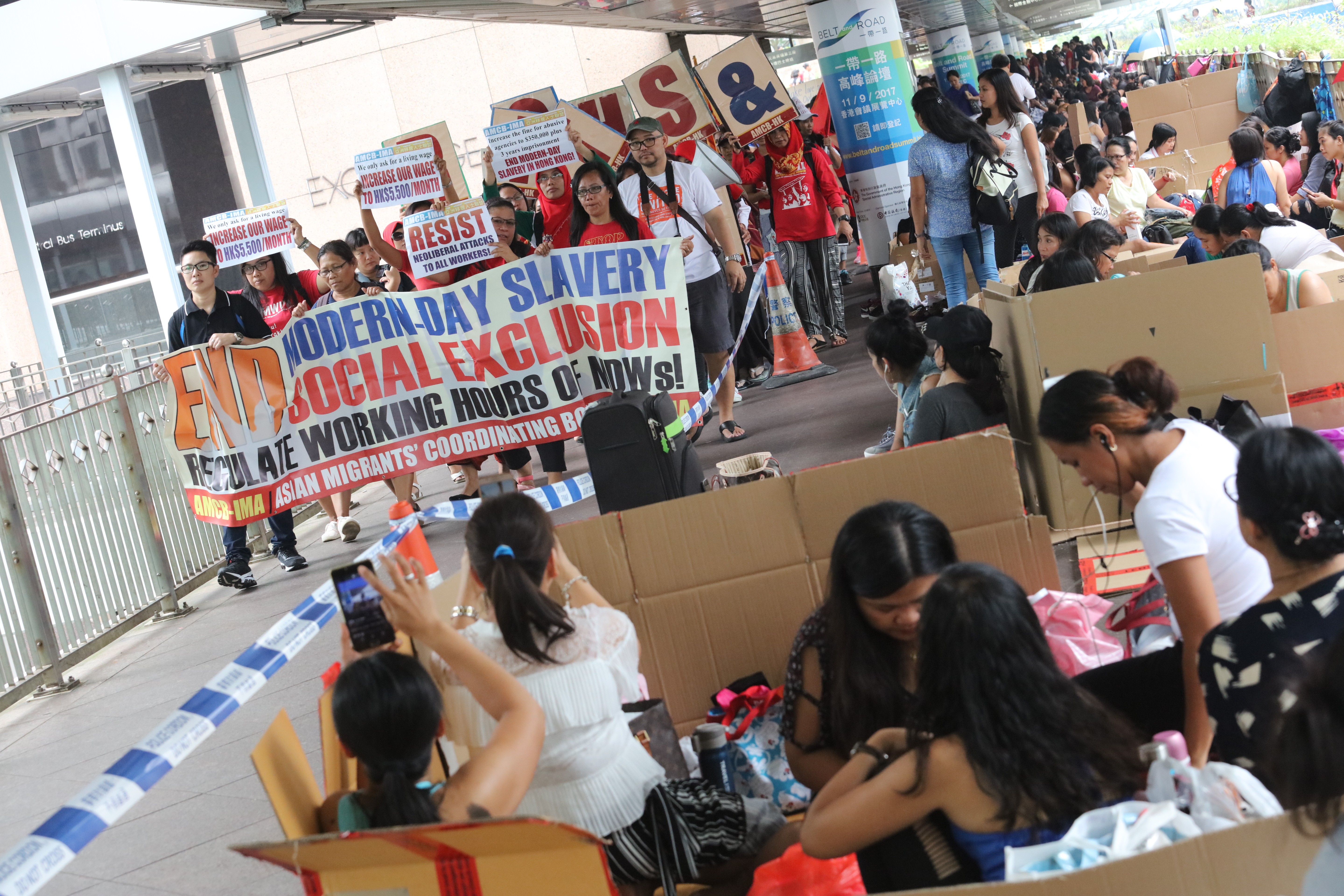 The Asian Migrants' Coordinating Body marches from Exchange Square in Central to the Labour Department to campaign for a wage increase for foreign domestic workers in September. Photo: Felix Wong