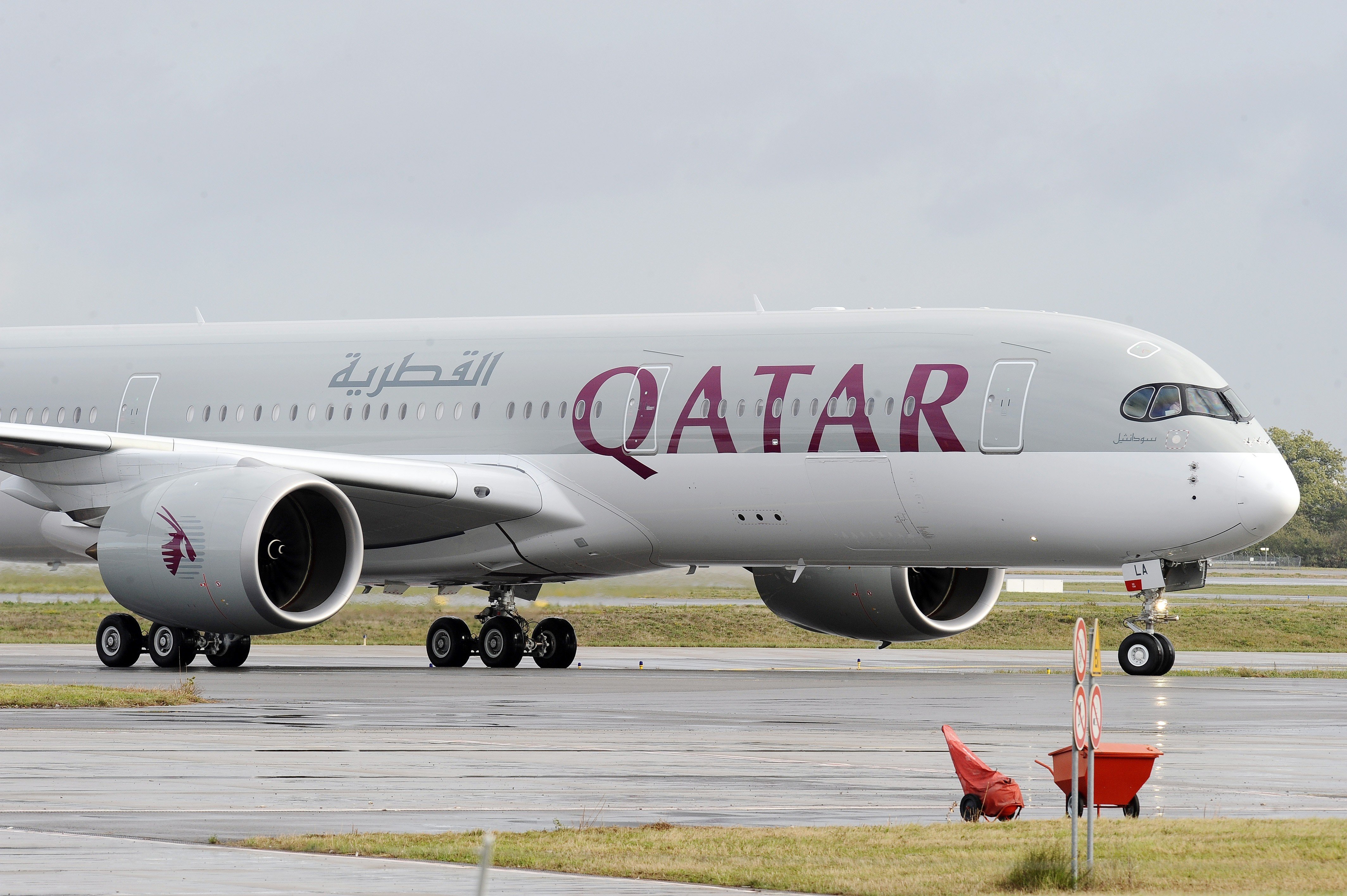 The first Airbus A350 bears the Qatar airline company logo on the tarmac of Toulouse Blagnac airport, southwestern France in 2014. Photo: AFP
