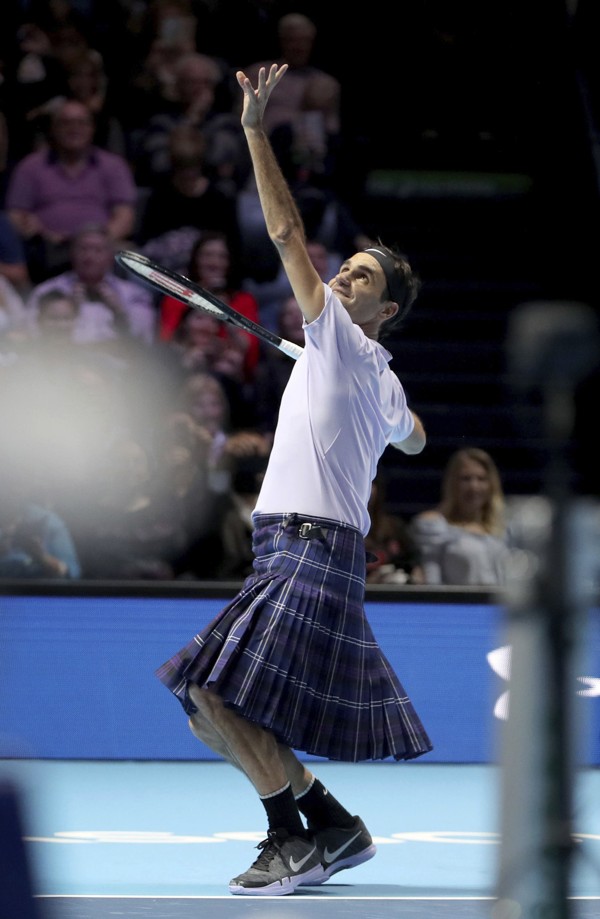 Roger Federer wears a traditional Scottish kilt as he plays against Andy Murray. Photo: AP