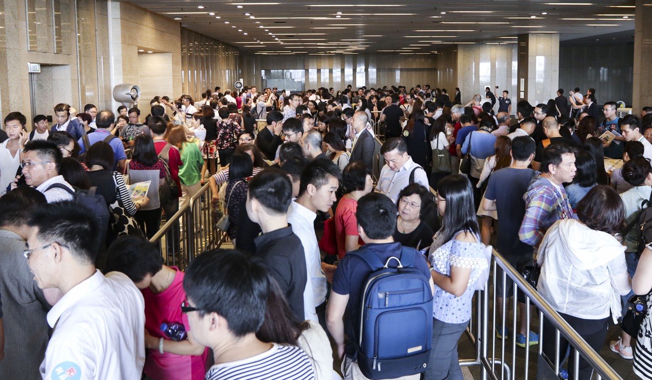 About half of those queuing up to buy flats at Sun Hung Kai Properties’ ‘Wings at Sea’ project were first-time buyers receiving help from their parents, according to Louis Chan of Centaline Property Agency. Photo: Roy Issa