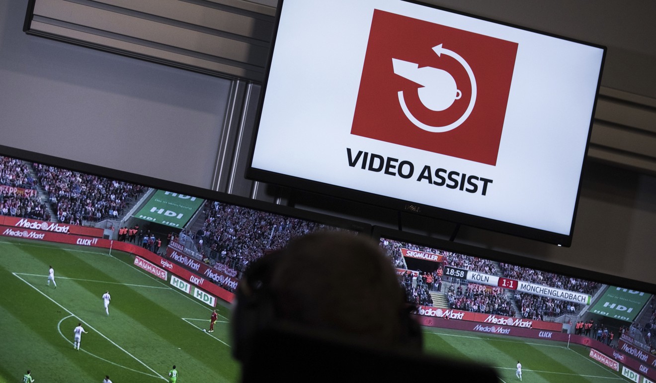 Referee Sascha Stegemann watches TV screens in the video assist centre in Cologne, Germany. Photo: AP