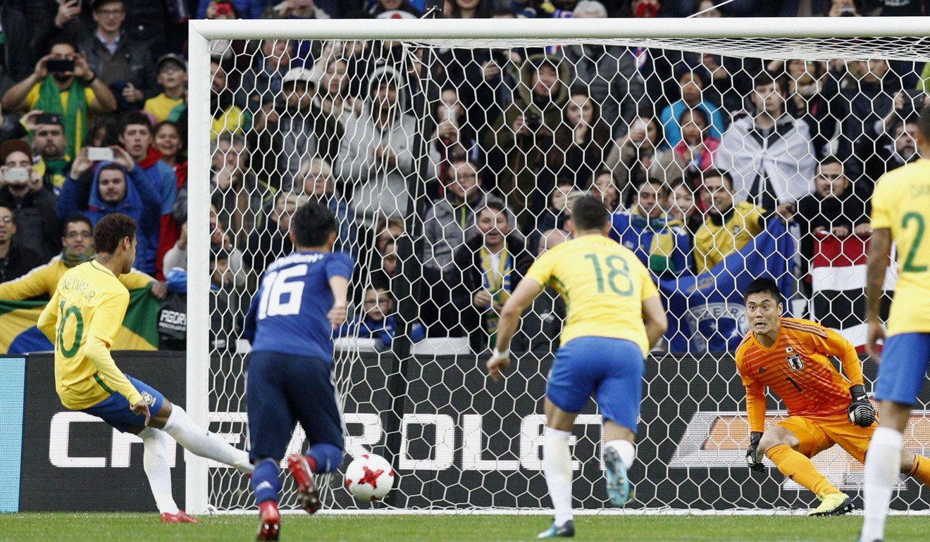 Neymar opens the scoring from the penalty spot in Lille. Photo: Kyodo