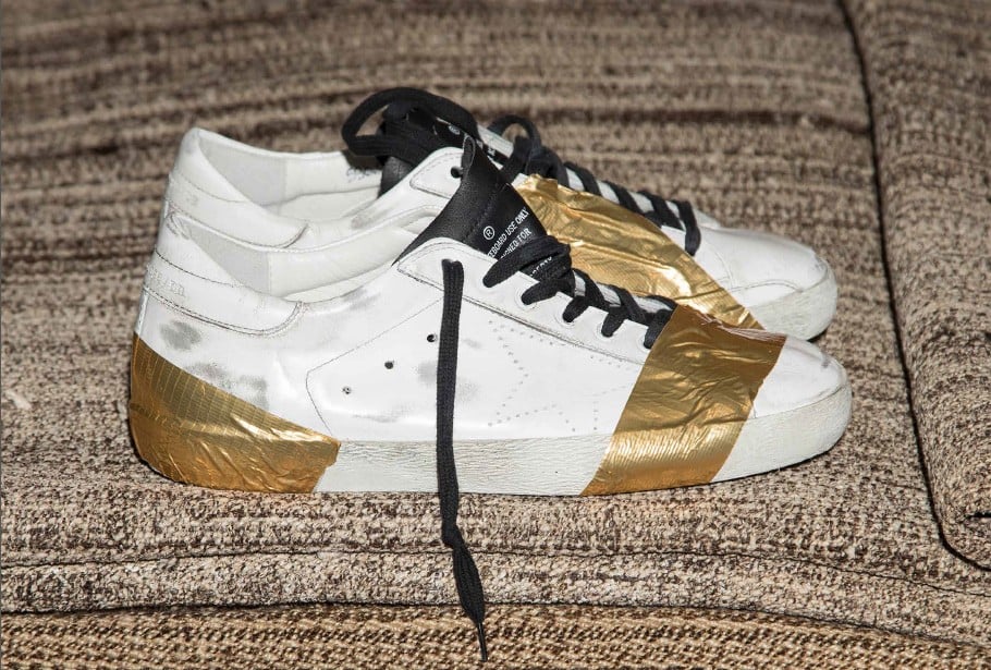 A pair of vintage-looking sneakers featuring golden tape from Golden Goose Deluxe’s autumn-winter 2017 collection.