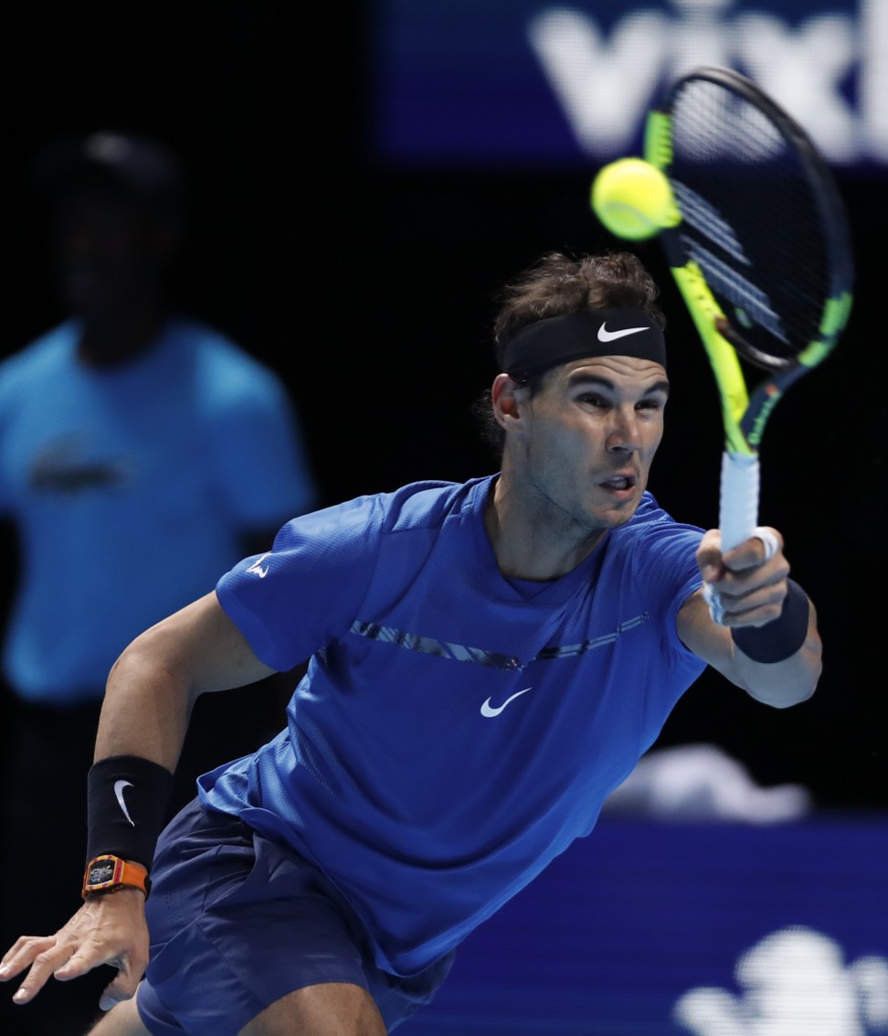 Rafael Nadal of Spain hits a return to David Goffin of Belgium during their group stage match in the ATP World Tour Finals at O2 Arena in London. Photo: Xinhua