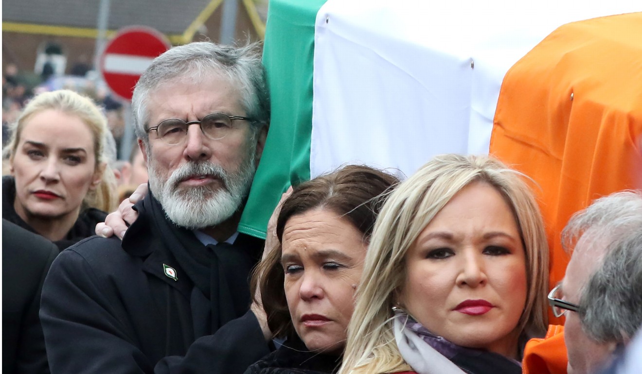 Adams, Sinn Fein Southern leader Mary Lou McDonald and Sinn Fein Northern Ireland Leader Michelle O'Neill act as pallbearers in the funeral procession for former Northern Ireland deputy first minister Martin McGuinness in Derry, in March, 2017. Photo: AFP