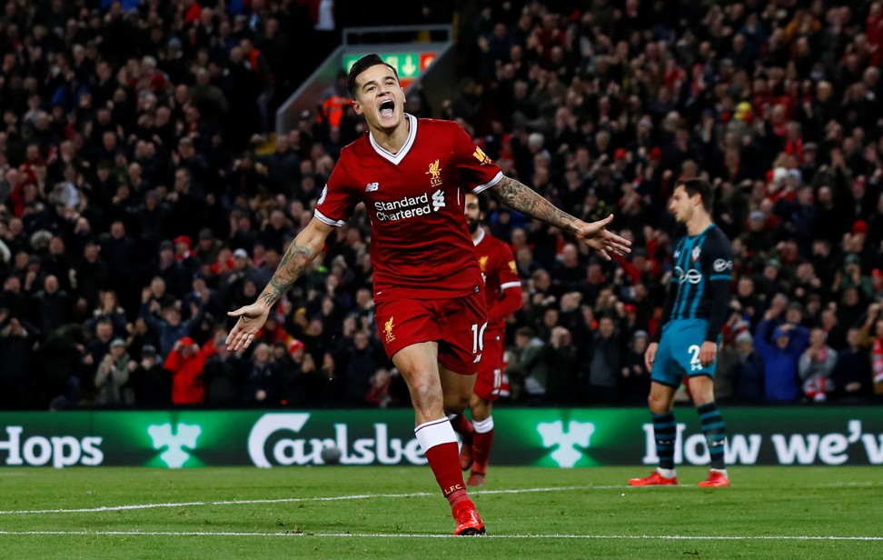 Philippe Coutinho celebrates after scoring Liverpool’s third goal. Photo: Reuters