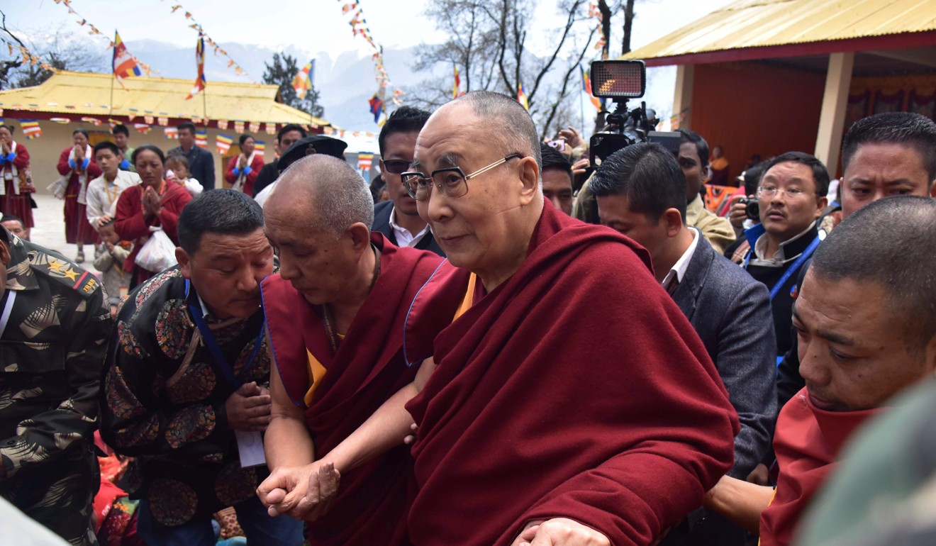 Exiled Tibetan spiritual leader the Dalai Lama arrives at Urgelling Monastery, the birthplace of the 6th Dalai Lama, in the district of Tawang in India's northeastern state of Arunachal Pradesh in April. China claims the area as southern Tibet. Photo: AFP