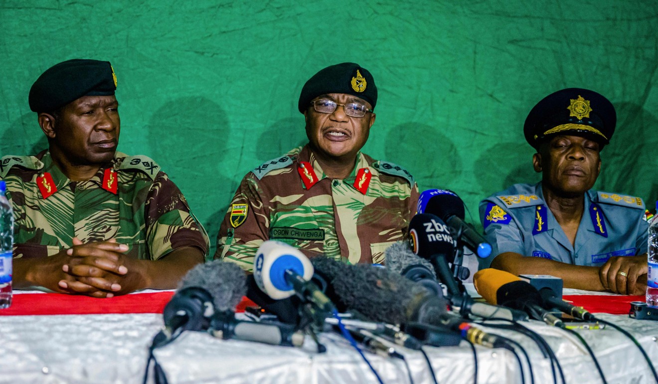 Zimbabwe's Commander Defence Forces General Constatntino Guveya Chiwenga (C) speaks during a press conference at the Tongogara Barracks on November 20, 2017 in Harare, Zimbabwe. Photo: AFP