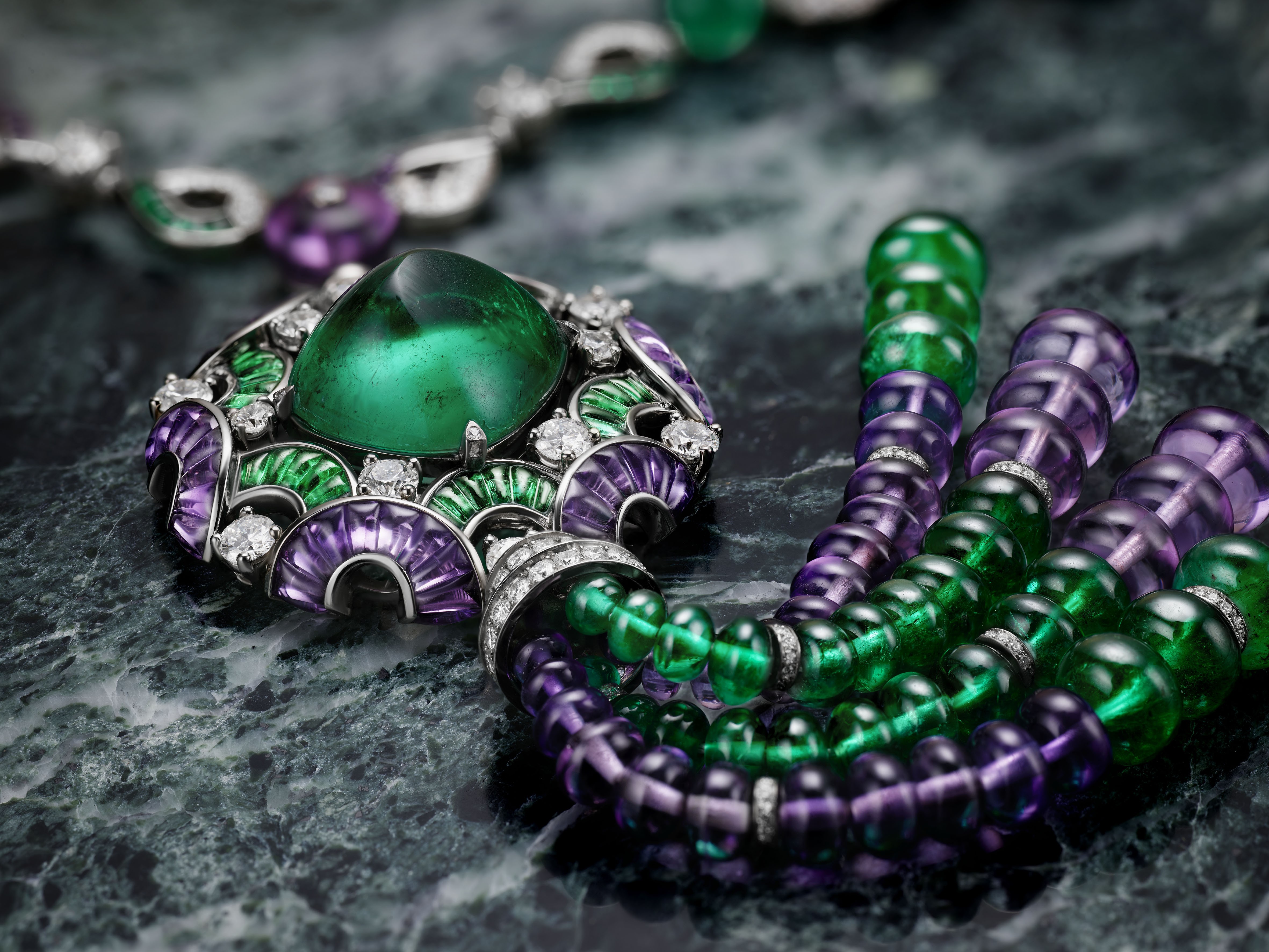 A Festa delle Principesse necklace is one of three themes from Bulgari's Festa high-jewellery collection. The piece includes a 22.6ct cabochon Colombian emerald, and 30 emerald and 33 purple quartz and amethyst beads.