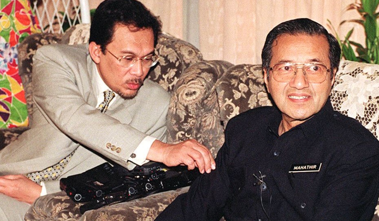 Anwar Ibrahim, as deputy prime minister, with then prime minister Mahathir Mohamad. Photo: Post Magazine