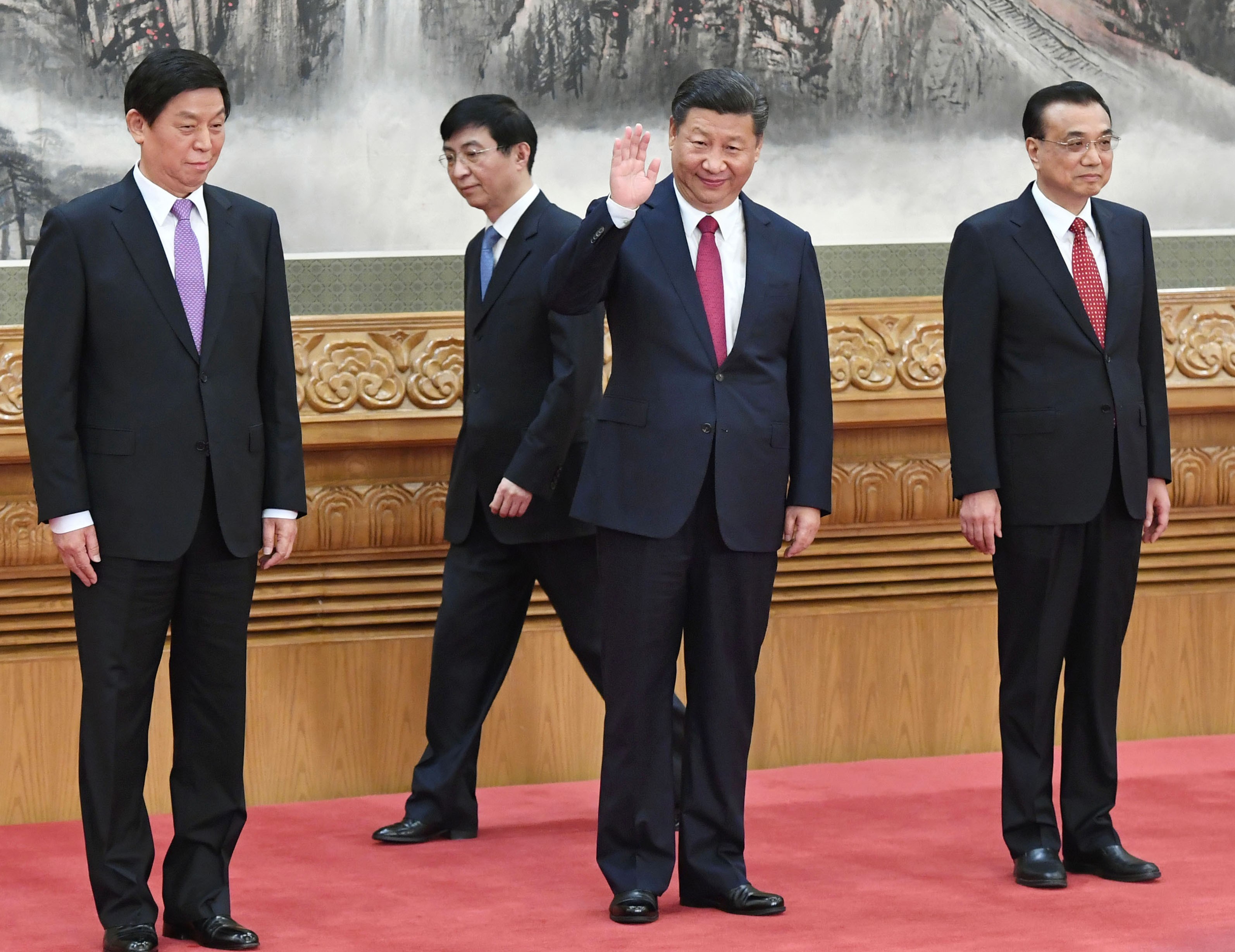 Chinese President Xi Jinping appears with his new leadership team at the Great Hall of the People in Beijing last month. China’s Politburo is now dominated by Xi loyalists. Photo: Kyodo