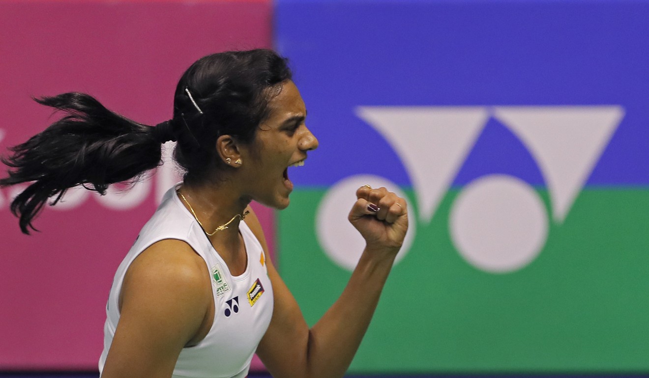 P.V. Sindhu of India celebrates her victory. Photo: AP